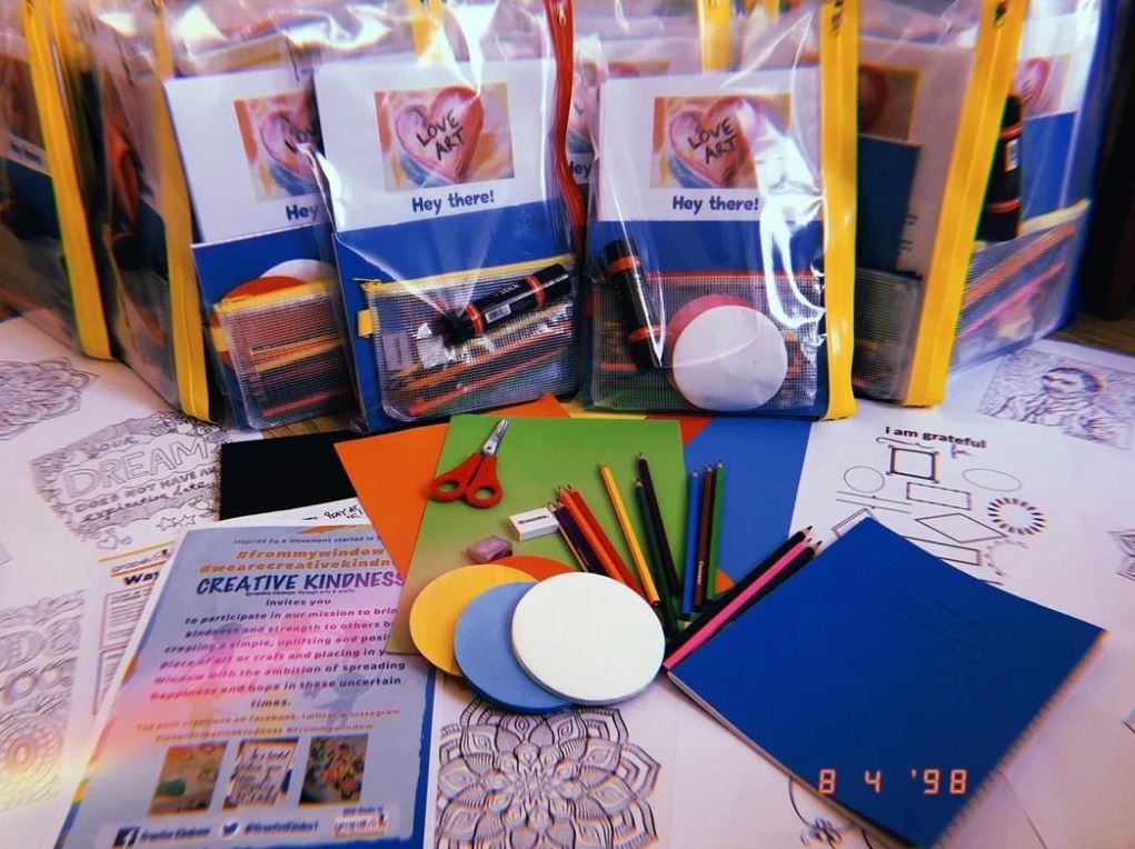 Image: Creative packs including pencils, scissors and coloured paper.